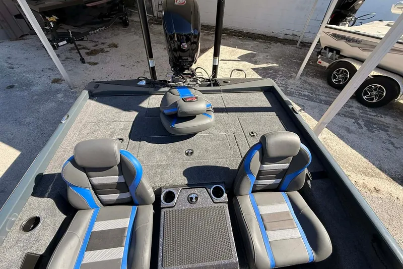 Slide: The Image of 2026 Ranger RT188P boat interior with blue and gray seating, showcasing modern design. - 3
