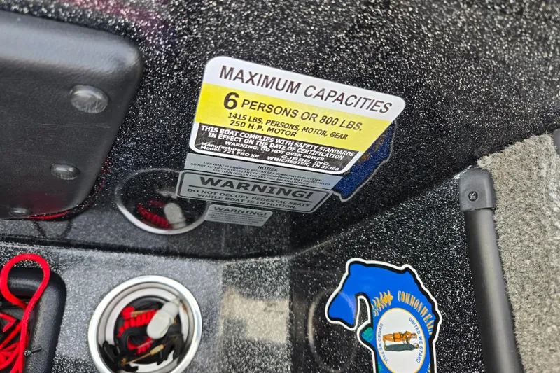 Slide: The Image of 2016 Phoenix 721 ProXP boat capacity label, maximum 6 persons or 800 lbs. - 13