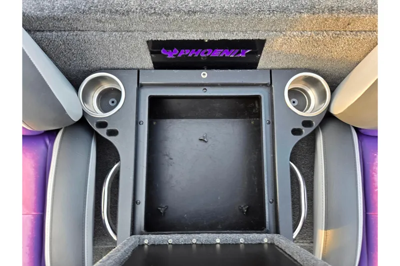 Slide: The Image of Interior of 2016 Phoenix 721 ProXP boat with cup holders and storage compartment. - 20