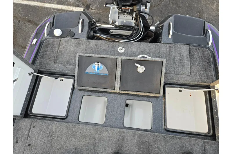 Slide: The Image of 2016 Phoenix 721 ProXP boat storage compartments and motor, top view. - 22