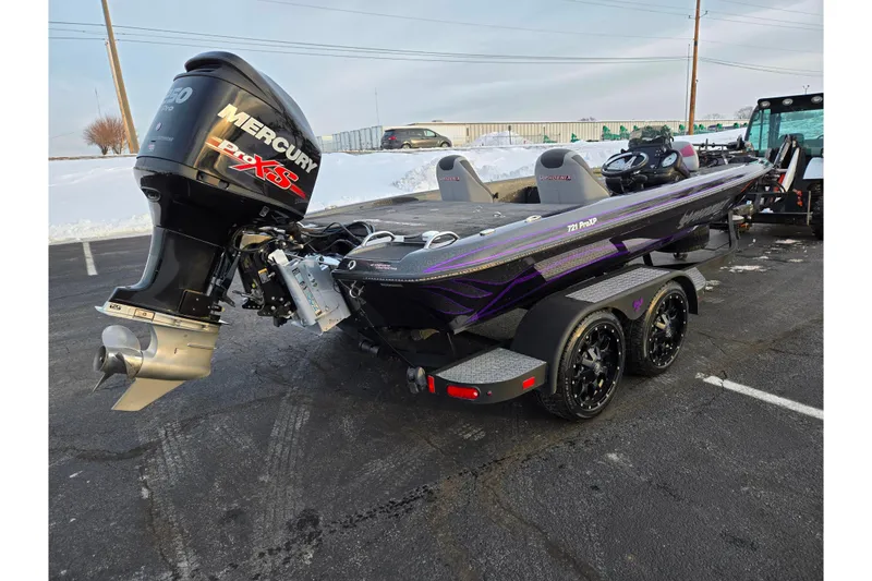 Slide: The Image of 2016 Phoenix 721 ProXP boat with Mercury engine, parked on a snowy lot. - 3