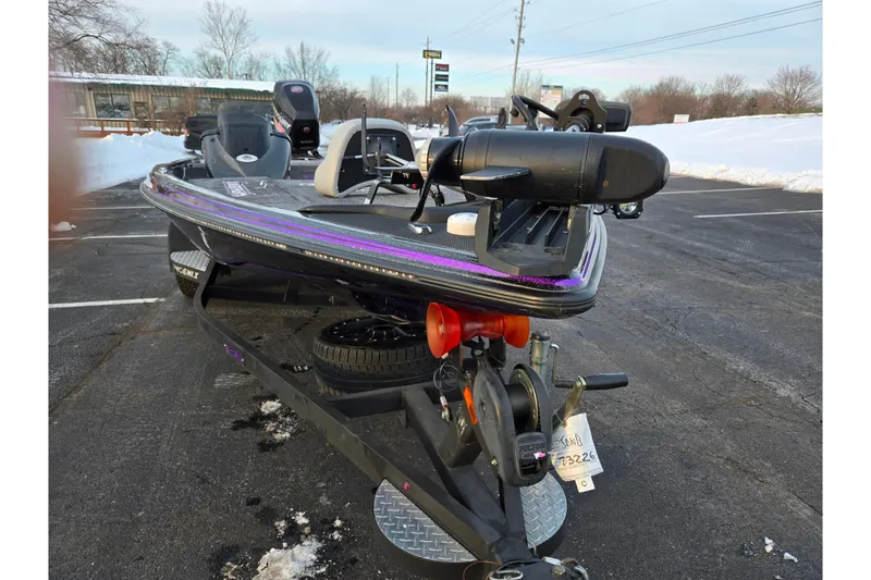 Slide: The Image of 2016 Phoenix 721 ProXP boat on trailer in snowy parking lot. - 6