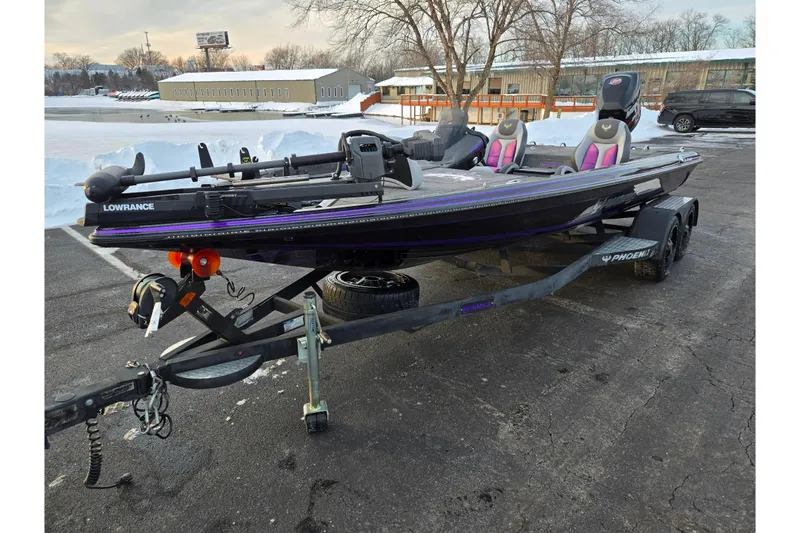 Slide: The Image of 2016 Phoenix 721 ProXP boat on trailer, parked in snowy lot. - 8