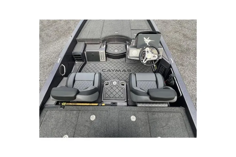 Slide: The Image of 2026 Caymas CX 21 PRO boat interior with dual seats and steering console. - 4
