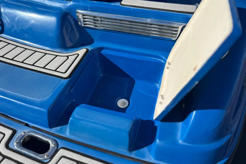 Slide: The Image of Blue Caravelle 22 Interceptor 2015 boat interior with open storage compartment. - 7