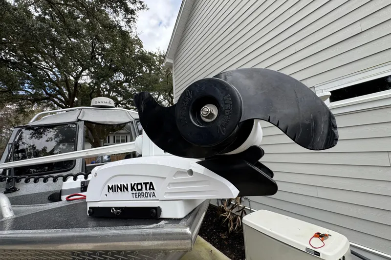 Slide: The Image of Minn Kota Terrova motor on 2016 North River 21' Seahawk boat, outdoor setting. - 21