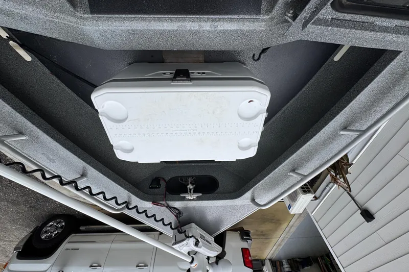 Slide: The Image of 2016 North River 21' Seahawk boat interior with cooler and equipment. - 35