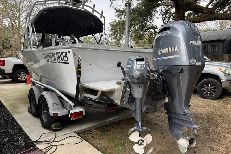 Slide: The Image of 2016 North River 21' Seahawk boat with Yamaha outboard motors on a trailer. - 4