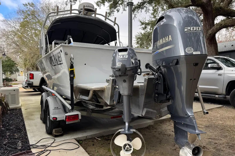 Slide: The Image of 2016 North River 21' Seahawk boat with Yamaha outboard motors on a trailer. - 8