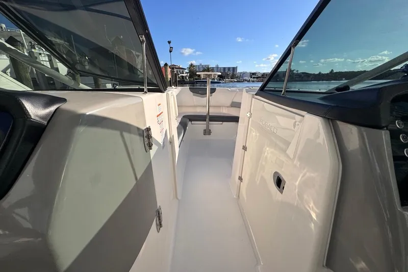 Slide: The Image of 2021 Robalo R317 Dual Console boat interior with open deck and seating area. - 41