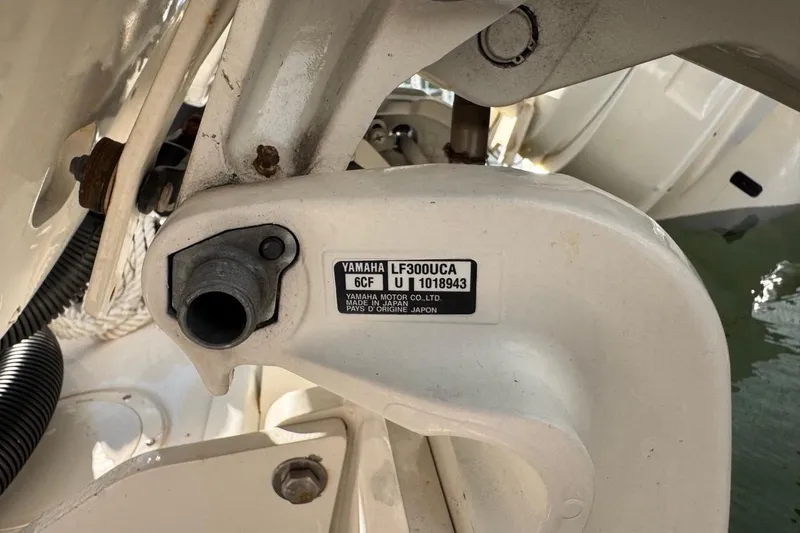 Slide: The Image of Close-up of Yamaha motor part on 2021 Robalo R317 Dual Console boat. - 66
