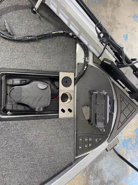 Slide: The Image of 2024 Caymas CX 20 boat controls with pedal and electronics. - 13
