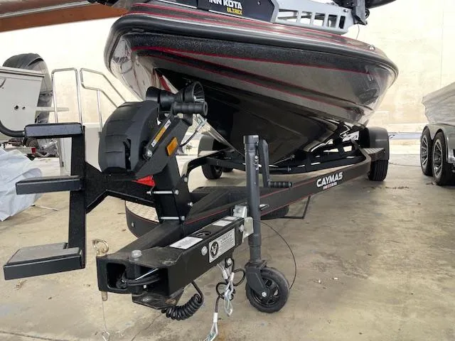 Slide: The Image of 2024 Caymas CX 20 boat on trailer in storage facility. - 15