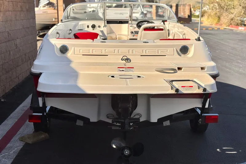 Slide: The Image of 2015 Bayliner 175 Bowrider boat, rear view, parked on a sunny day. - 4
