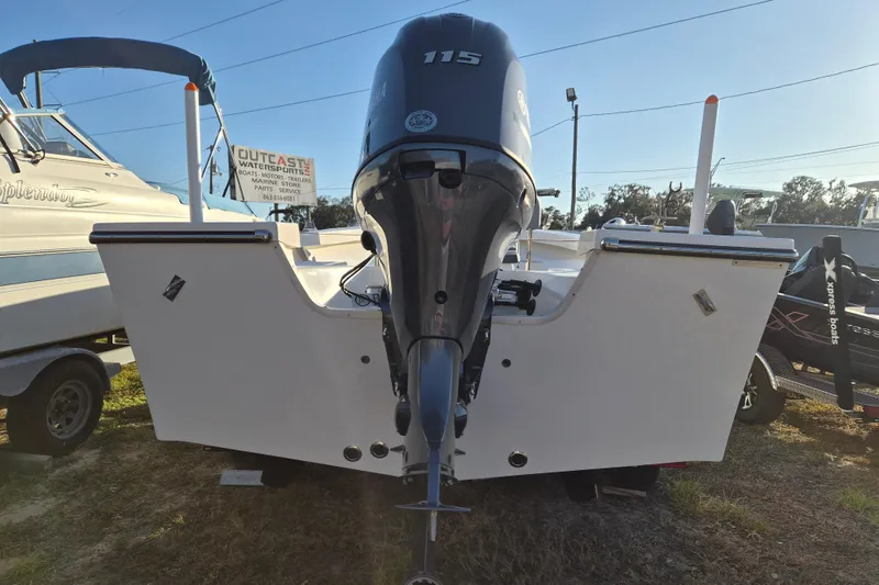 Slide: The Image of 2026 May-Craft 192 boat with 115 HP outboard motor, displayed outdoors. - 3