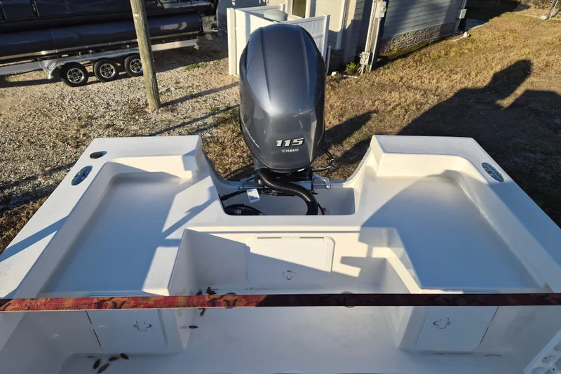 Slide: The Image of 2026 May-Craft 192 boat with Yamaha 115 engine, rear view. - 5