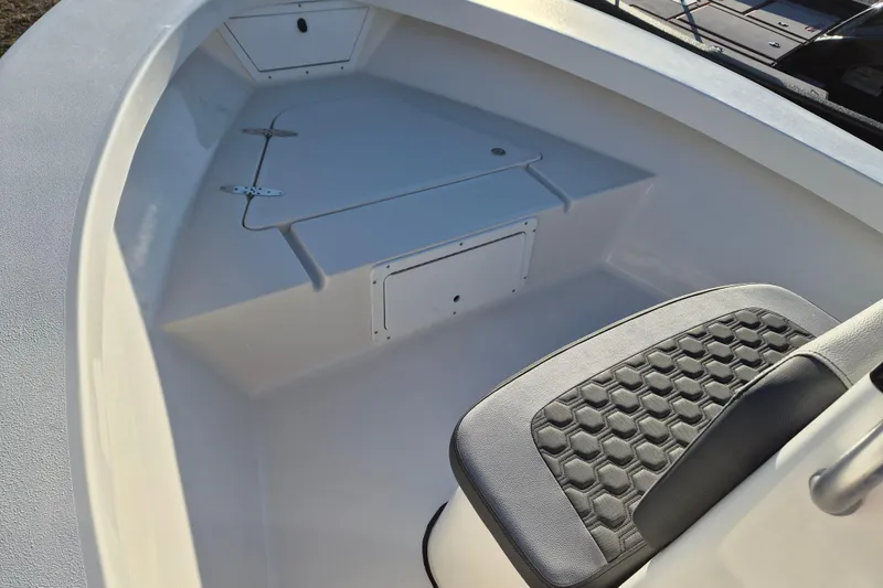 Slide: The Image of 2026 May-Craft 192 boat interior with seating and storage compartments. - 8
