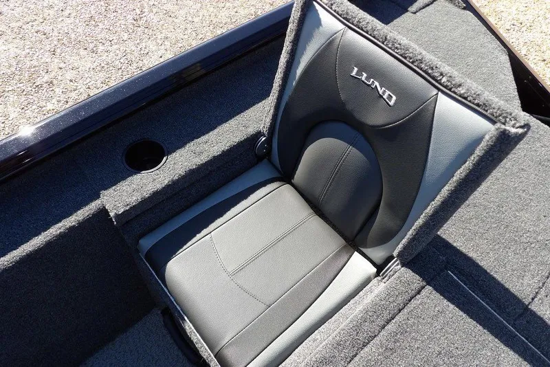Slide: The Image of 2026 Lund 1875 Renegade boat seat with logo, featuring gray and black upholstery. - 16