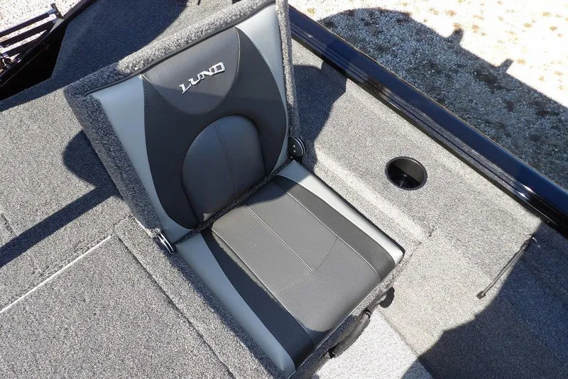 Slide: The Image of 2026 Lund 1875 Renegade boat seat with gray upholstery and cup holder. - 19