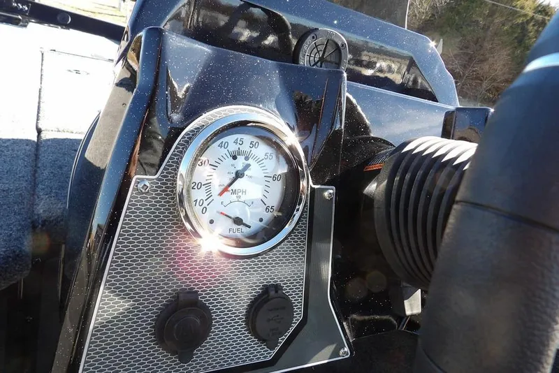 Slide: The Image of Dashboard of 2026 Lund 1875 Renegade boat with speedometer and controls. - 31