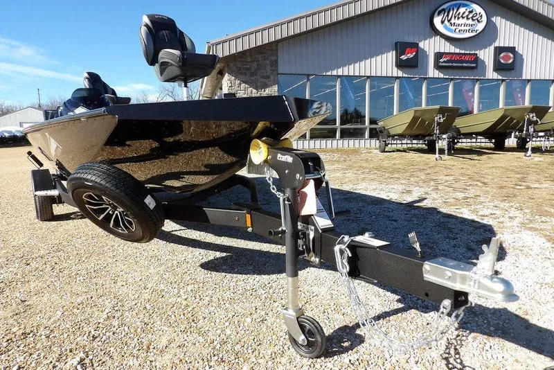 Slide: The Image of 2026 Lund 1875 Renegade boat on trailer at White's Marine Center. - 38