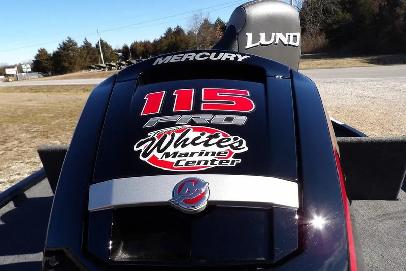 Slide: The Image of 2026 Lund 1875 Renegade boat with Mercury 115 Pro engine, White's Marine Center branding. - 39