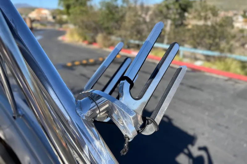 Slide: The Image of Close-up of a 2008 Crownline 21 SS boat's polished metal wakeboard rack. - 10