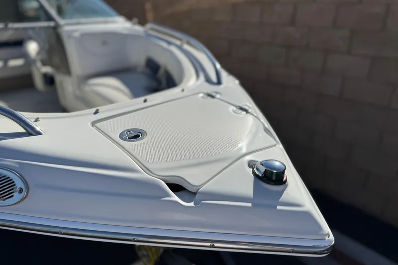 Slide: The Image of 2008 Crownline 21 SS boat bow with sleek design and chrome details. - 12