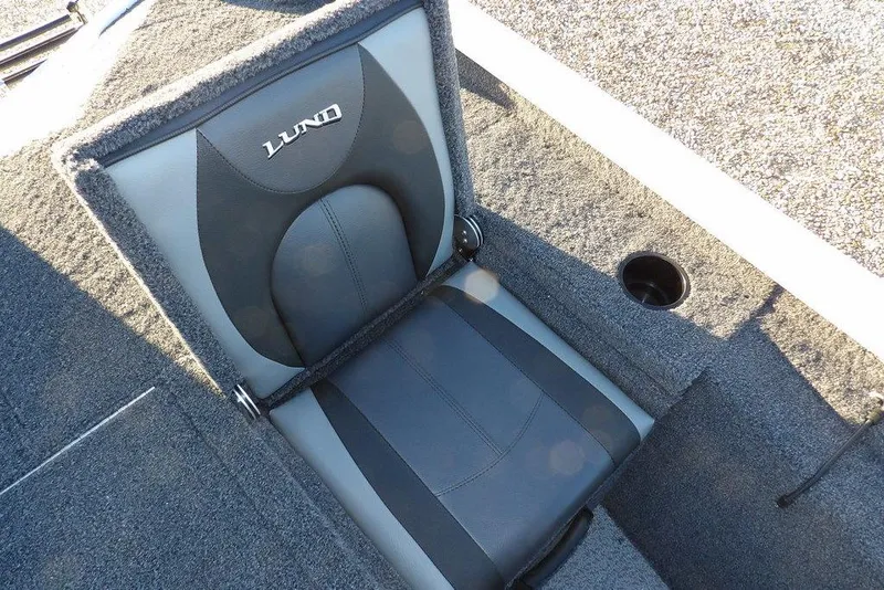 Slide: The Image of 2026 Lund 1875 Renegade boat seat with cup holder, gray and black upholstery. - 18