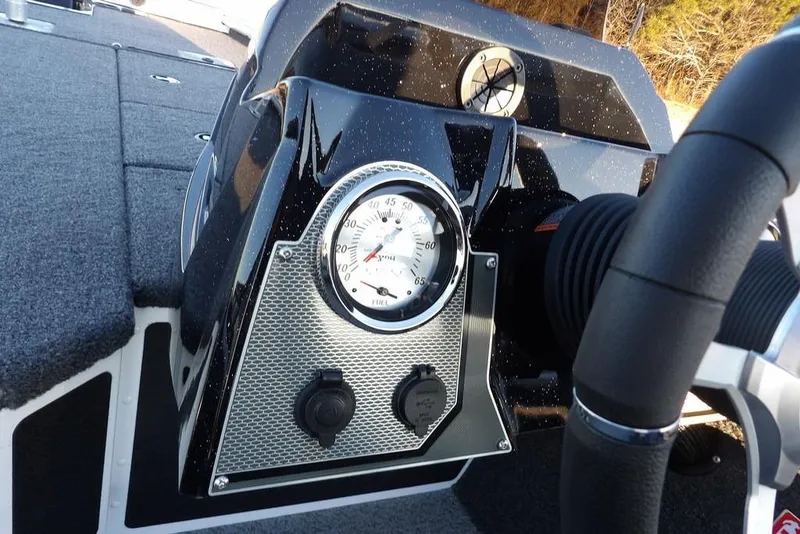 Slide: The Image of Dashboard of 2026 Lund 1875 Renegade boat with gauge and controls. - 28