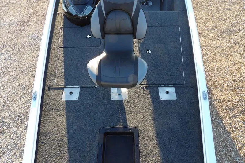 Slide: The Image of 2026 Lund 1875 Renegade boat interior with seating and carpeted deck. - 34