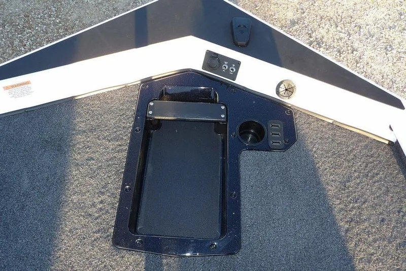 Slide: The Image of 2026 Lund 1875 Renegade boat deck with control panel and storage compartment. - 35