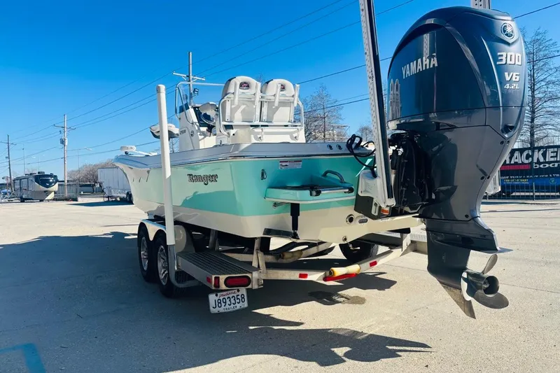 Slide: The Image of 2021 Ranger 2510 Bay boat with Yamaha 300 V6 engine on trailer. - 3