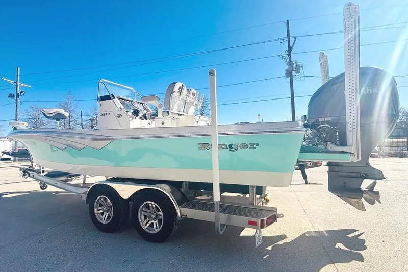 Slide: The Image of 2021 Ranger 2510 Bay boat on trailer, side view. - 4