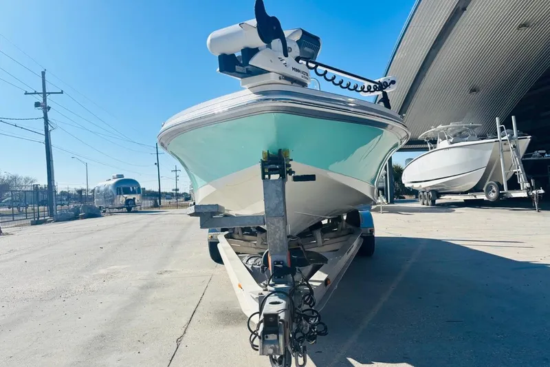 Slide: The Image of 2021 Ranger 2510 Bay boat on trailer in outdoor storage area. - 8