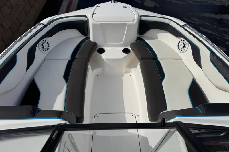 Slide: The Image of 2020 Yamaha Boats AR210 interior with sleek seating and modern design. - 14