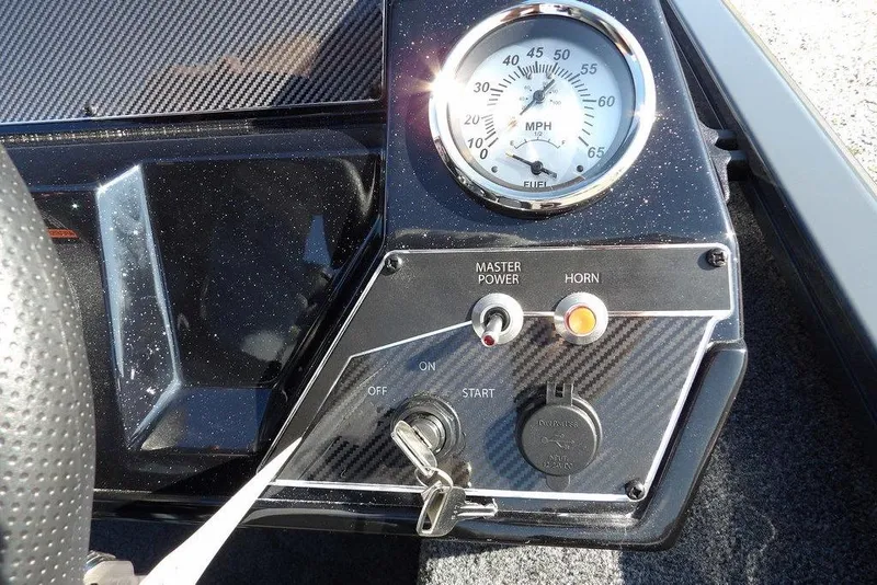 Slide: The Image of Dashboard of 2026 Crestliner XFC 189 boat with speedometer and controls. - 19