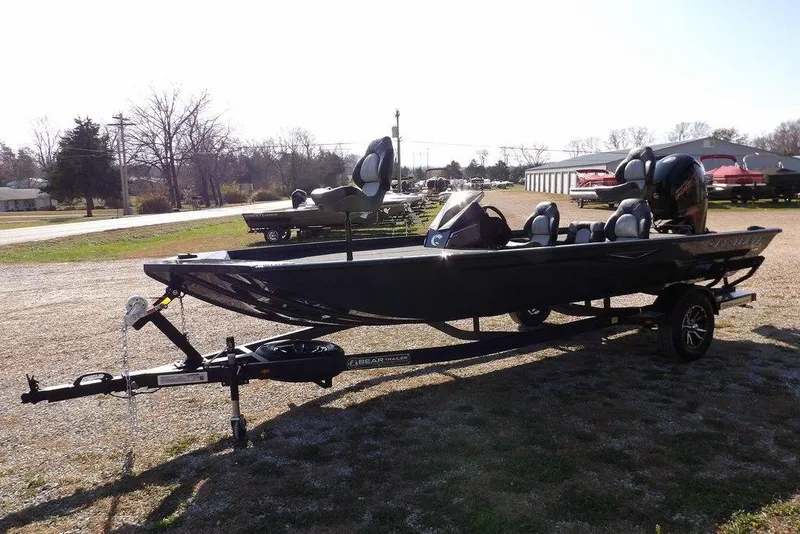 Slide: The Image of 2026 Crestliner XFC 189 fishing boat on trailer in outdoor setting. - 4
