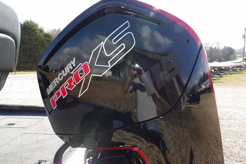 Slide: The Image of 2026 Crestliner XFC 189 with Mercury Pro XS engine, reflecting outdoor scenery. - 43