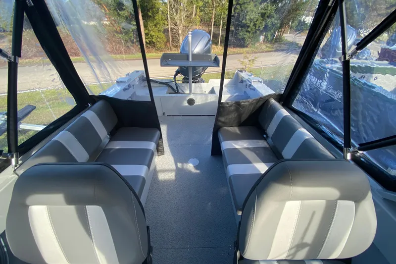 Slide: The Image of Interior of 2026 Hewescraft 180 Sportsman with gray seating. - 5