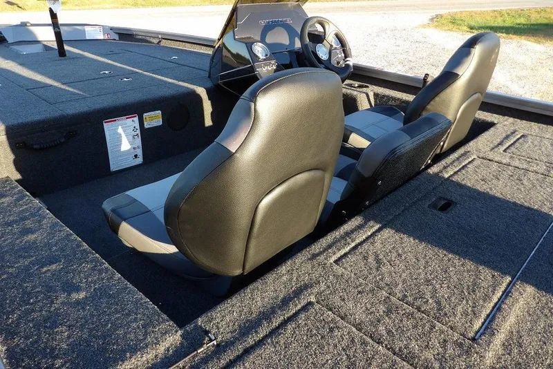 Slide: The Image of 2026 Crestliner XFC 189 boat interior with dual seats and spacious deck layout. - 10