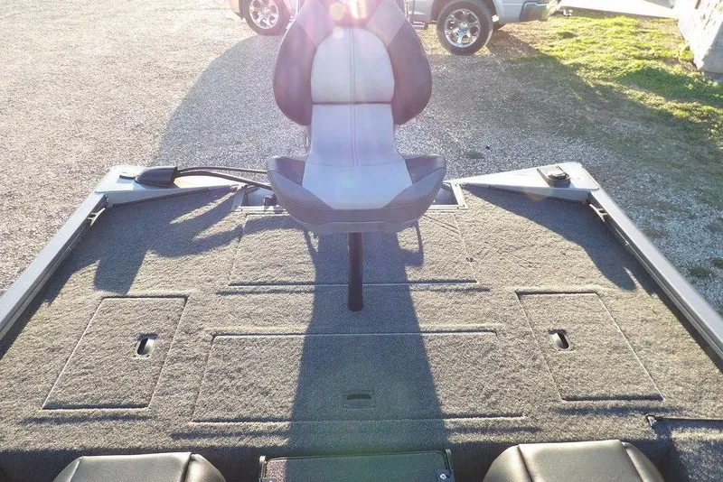 Slide: The Image of 2026 Crestliner XFC 189 boat deck with seating and storage compartments. - 13