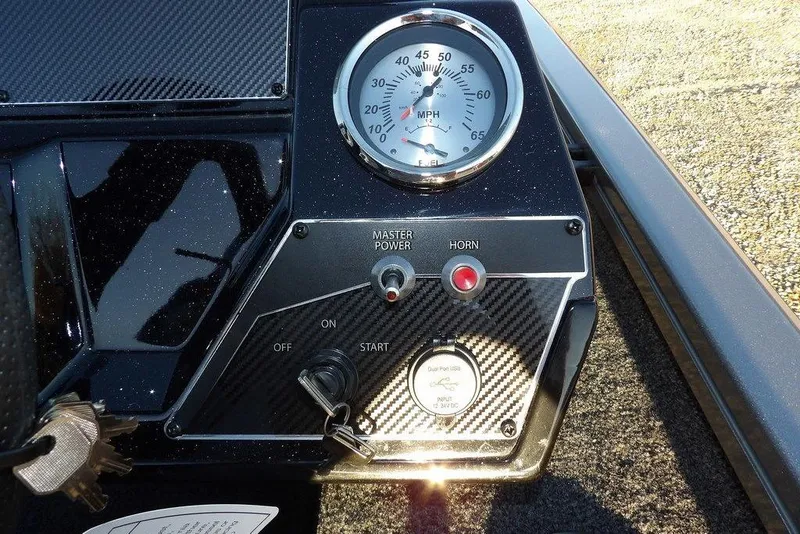 Slide: The Image of Dashboard of 2026 Crestliner XFC 189 boat with speedometer and controls. - 20
