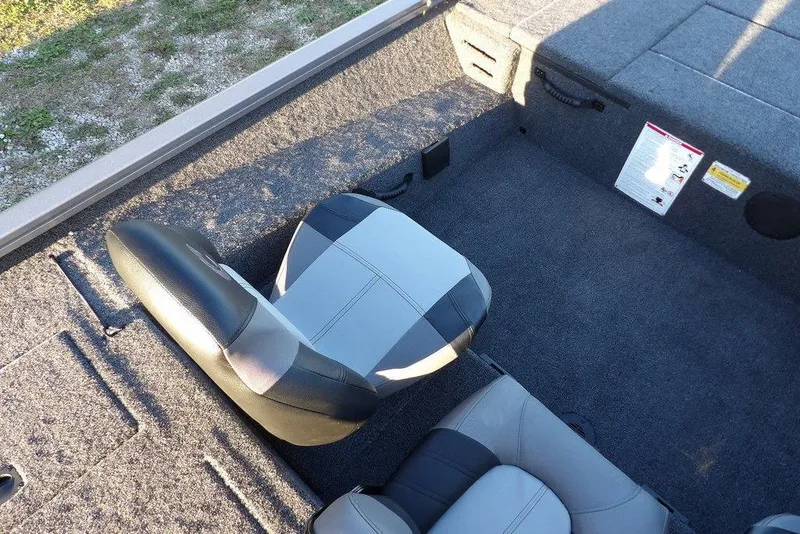 Slide: The Image of 2026 Crestliner XFC 189 boat interior with gray and black seating. - 21