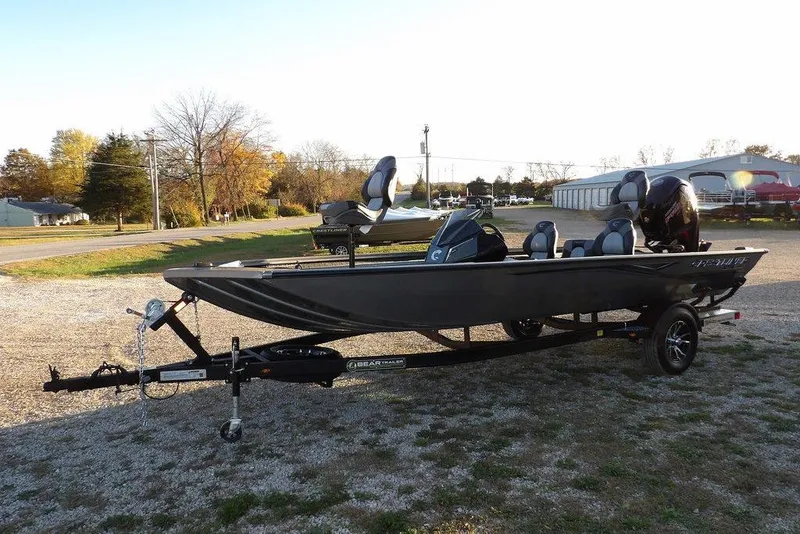 Slide: The Image of 2026 Crestliner XFC 189 fishing boat on trailer in outdoor setting. - 3