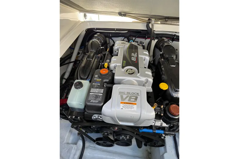 Slide: The Image of Engine of 2014 Formula 310 Sun Sport boat, featuring a powerful 8.2L V8 engine. - 12