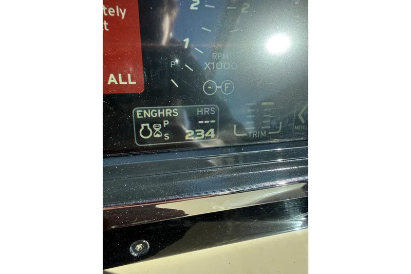 Slide: The Image of Dashboard of 2014 Formula 310 Sun Sport showing 234 engine hours. - 14