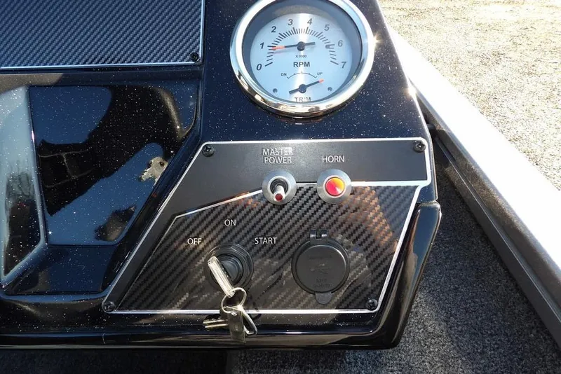 Slide: The Image of Dashboard of 2026 Crestliner XFC 189 boat with RPM gauge and controls. - 20