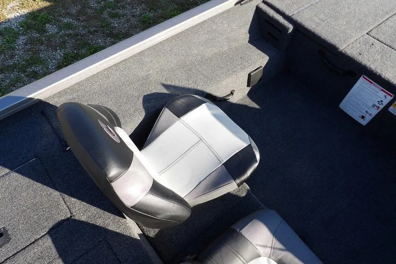 Slide: The Image of 2026 Crestliner XFC 189 boat interior with gray and black seating. - 22