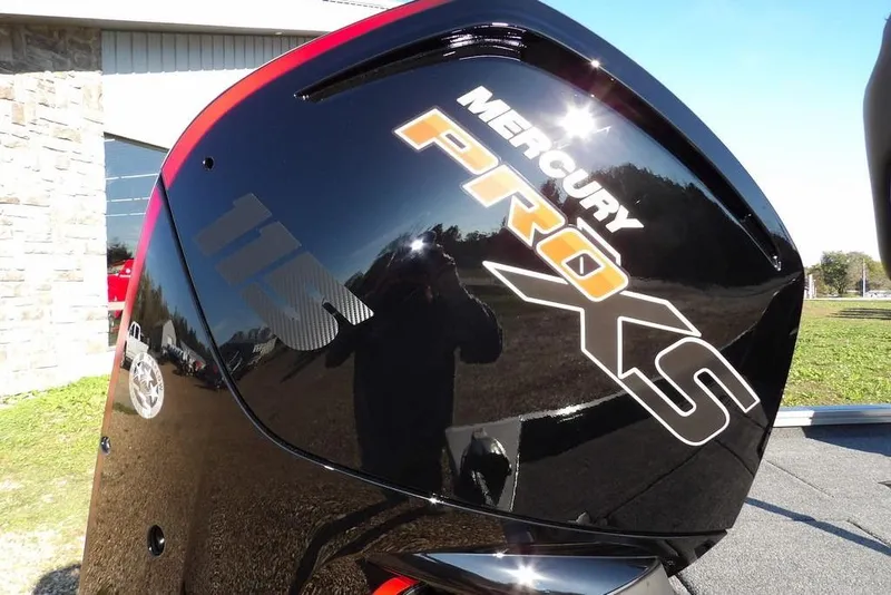 Slide: The Image of Mercury Pro XS engine on 2026 Crestliner XFC 189 boat, reflecting sunlight. - 41